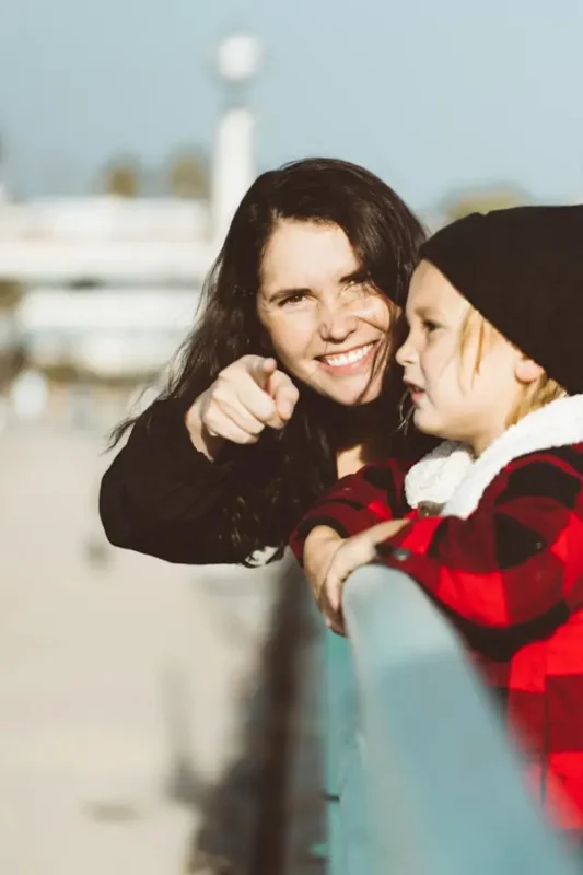 mother staring directly into the camera pointing